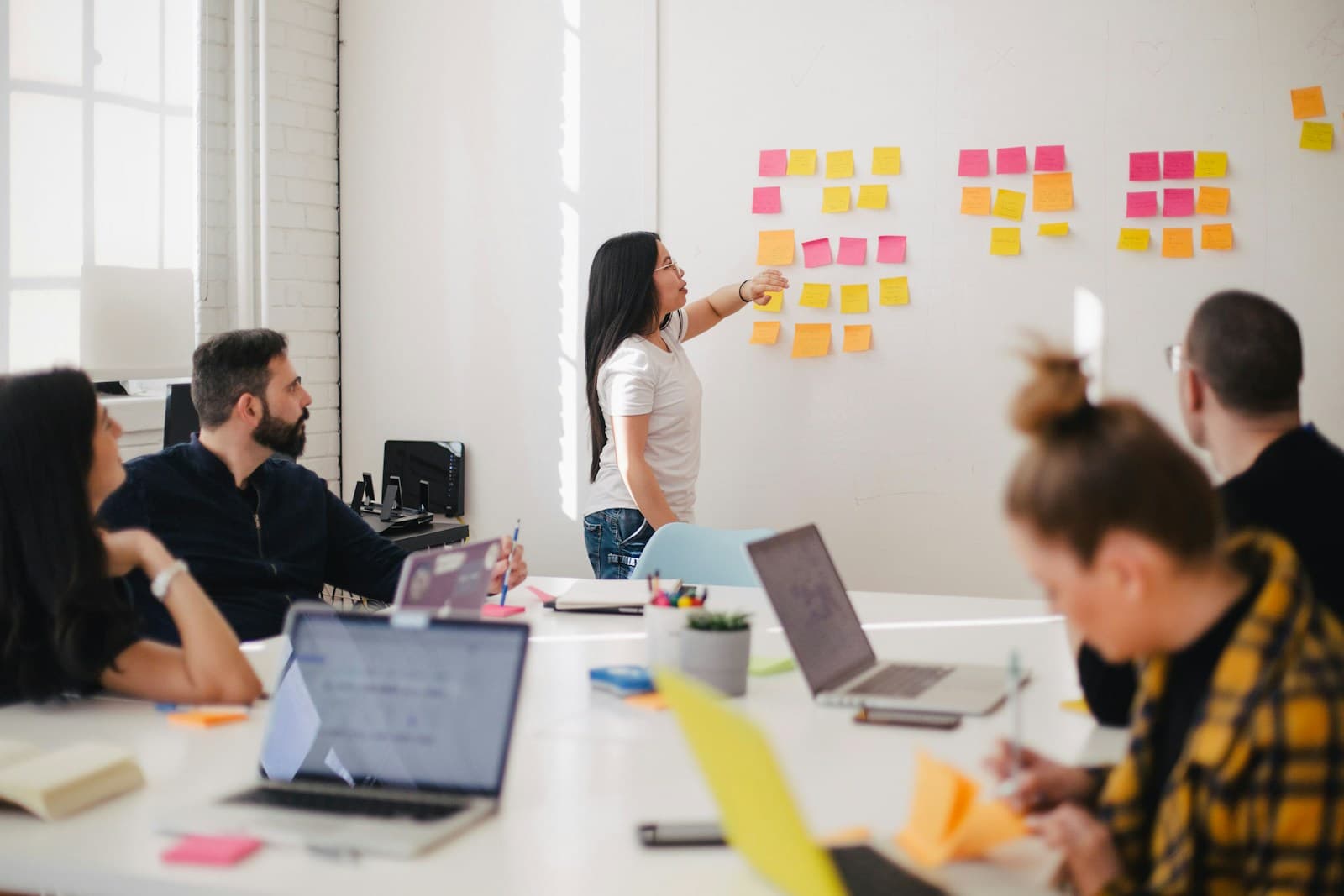 International professionals collaborating in a contemporary workspace